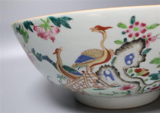 An 18th century Chinese porcelain punch bowl, brightly painted in enamels, 30cm